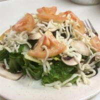 House Salad · Lettuce, tomatoes, black olives, mushrooms and mozzarella cheese.