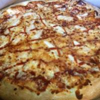 BBQ Chicken Pizza · BBQ sauce, chicken, red onions and cheese.
