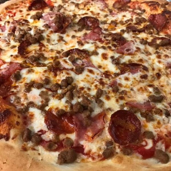 Meat Lovers Pizza · Pizza sauce, Pepperoni, Ham, hamburger, Sausage and cheese.
