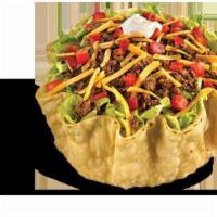 Beef Taco Salad ·  Crispy tortilla bowl filled with seasoned beef, shredded cheddar cheese, crisp shredded let...