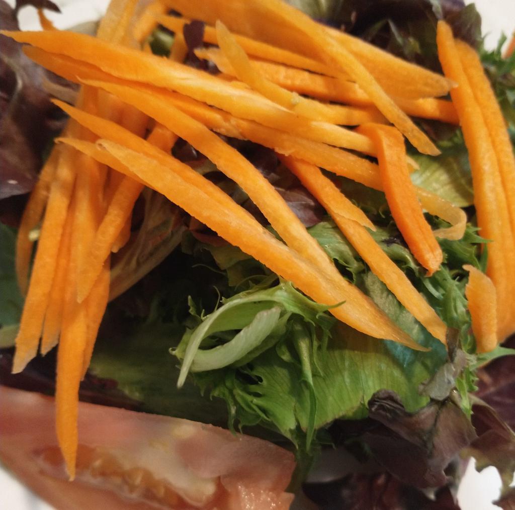 Mista Salad · Mesculin salad , cucumbers, tomatoes, carrots in a vinegair dressing.