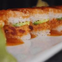 Royalty Roll · Pressed Osaka-style sushi, crunchy spicy tuna, avocado, rice and fresh salmon with chili sau...