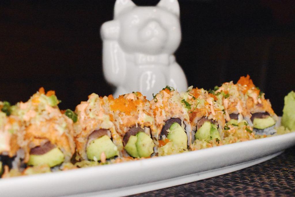 Exotic Roll · Peppered tuna and avocado with spicy tuna and tempura crunch.
