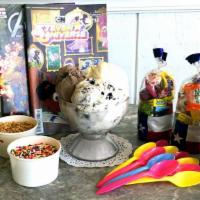 Large Fun Pack · 2 quarts of ice cream, 3 cups of toppings, 10 cups and spoons, A family game, and 2 comic bo...