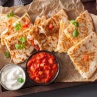 Quesadilla · Grilled tortillas stuffed with mozzarella and cheddar cheese, served with sour cream and sal...