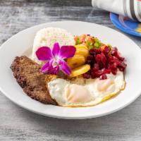 Silpancho · Lightly breaded beef, fried eggs, rice, beet salad, tomato, scallions, crispy potato and oni...