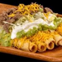 5 Rolled Tacos Cheese with Carne Asada · Cheese guacamole sour cream lettuce and  Carne asada 