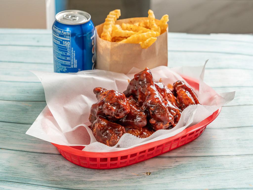 1. Wings Combo · Cooked wings of a chicken coated in sauce or seasoning. Served with fries and drink.