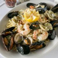 Seafood Pescatore · Clams, mussels, shrimp and crab with your choice of red or white sauce. 