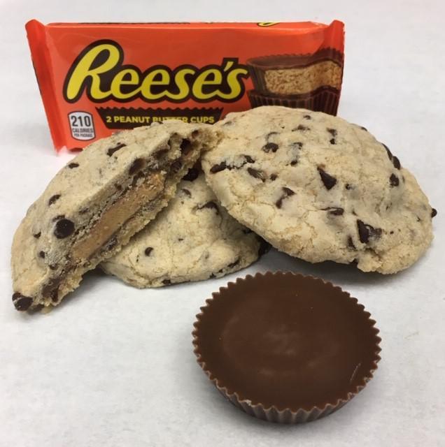 Big Reveal: Peanut Butter Cup · A chocolate chip cookie with a full-sized Reese's Peanut Butter cup inside.  Additional flavors available in store.