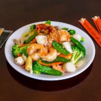 Seafood Delights · A delightful combination of jumbo shrimps, lobster, scallops, sautéed with Chinese vegetable...