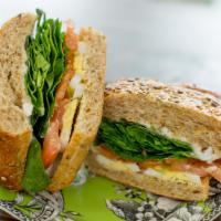 Eggology · 100% Organic. 
Hard-boiled Egg, Tomatoes, Sunflower Sprouts, Baby Spinach, Veganaise on a Br...