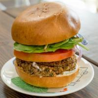 Bison Meatball Burger · 100% Organic. 
Locally farmed Buffalo. Served on a bun with Caramilized Onions, Grilled Mush...