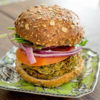 NEW RECIPE Harvest Veggie Burger (V) · 100% Organic Black Bean, Beet, Butternut squash, zucchini, carrot and sweet potato. Served o...