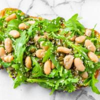 Hit Up · Smashed Avocado, Beans, Capers, Arugula, Drizzled Hot Spicy Dressing