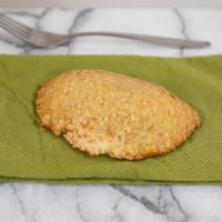Potato Scallion Empanada (V) · 100% Organic.  Yukon Potatoes, vegan cream cheese, and nutritional yeast. Made with in house...