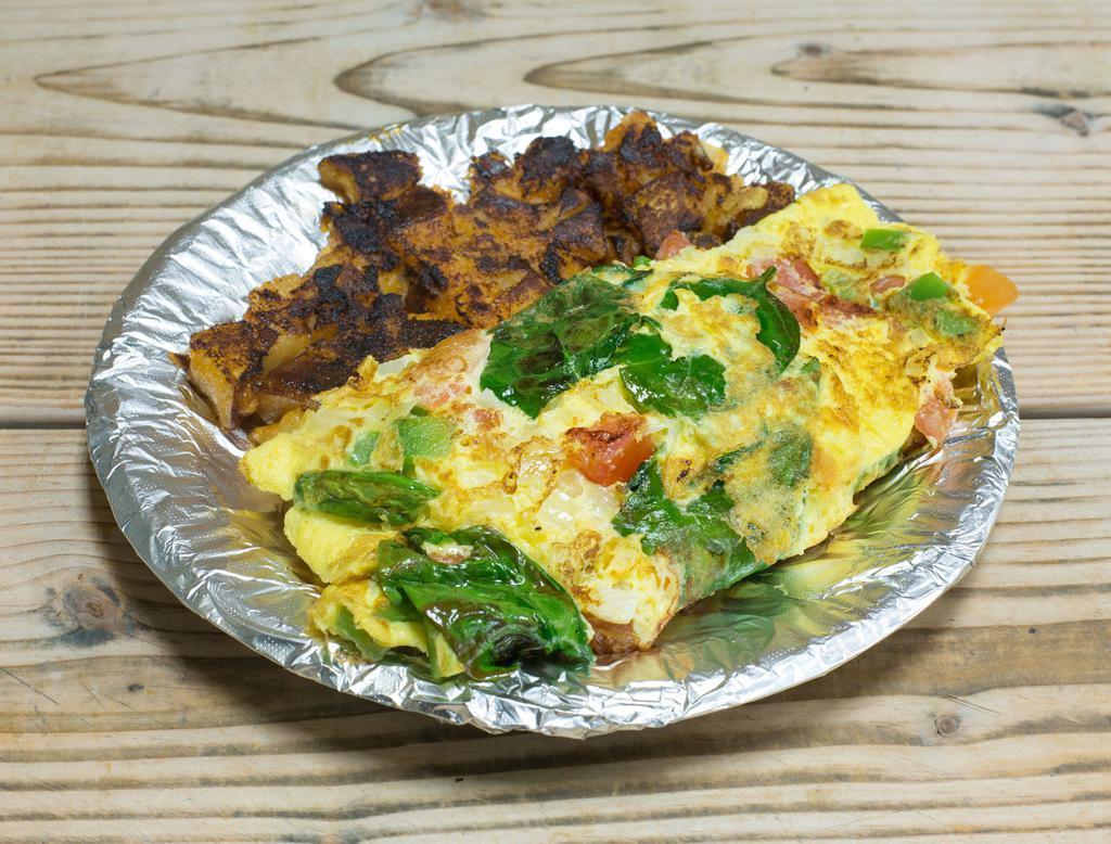 The Mediterranean Omelette · Peppers, onions, tomato, spinach and feta cheese. Served with butter or jelly.