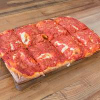 GiGi's Upside Down Pizza · San Marzano tomato sauce, Pecorino Romano and extra virgin olive oil.