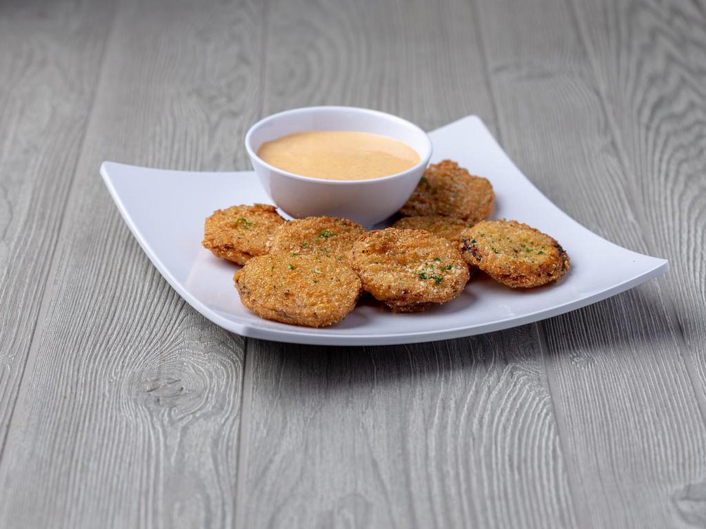 Fried Green Tomatoes · Served with Cajun ranch dressing.