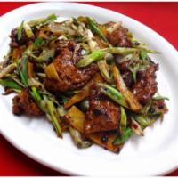 7. Sauteed Sliced Pork with Ginger Scallion and Black Bean Szechuan · Spicy.