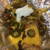 BURRITOS W/CHILI AND CHEESE · TWO BURRITOS COVERED IN DELICIOUS MELTED CHEESE AND HOT CHILI