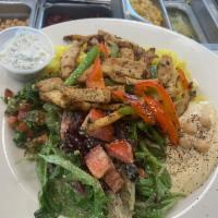 Chicken Shawarma Plate · Come with rice and a choice of vegetables or salad.