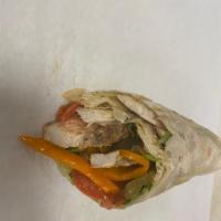 Shawarma Wrap · Chicken or lamb, lettuce, tomato, pickle with yogurt sauce.