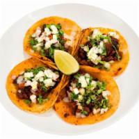 Tacos Chilangos (Street Tacos) · Choice of Carne Asada, Adobada, Chicken, or Carnitas