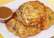 44. Roast Pork Egg Foo Young · Served with rice. 