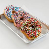Sprinkle Donuts · Iced donut with sprinkles.