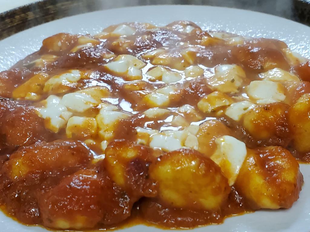 Gnocchi Alla Sorrentina · Potato gnocchi, tomato sauce, Buffalo mozzarella and basil.