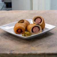 Jalapeno Cheddar Mini Kolache · Jalapeno and cheddar mini sausage wrapped in our jalapeno blended homemade house dough.
