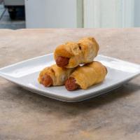 Hickory Smoked Cheddar Mini Kolache · Hickory smoked cheddar mini sausage wrapped in our homemade house dough.