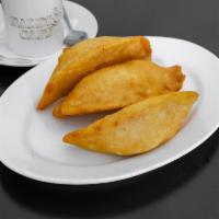 Empanadas · Crescent shaped turnover. 