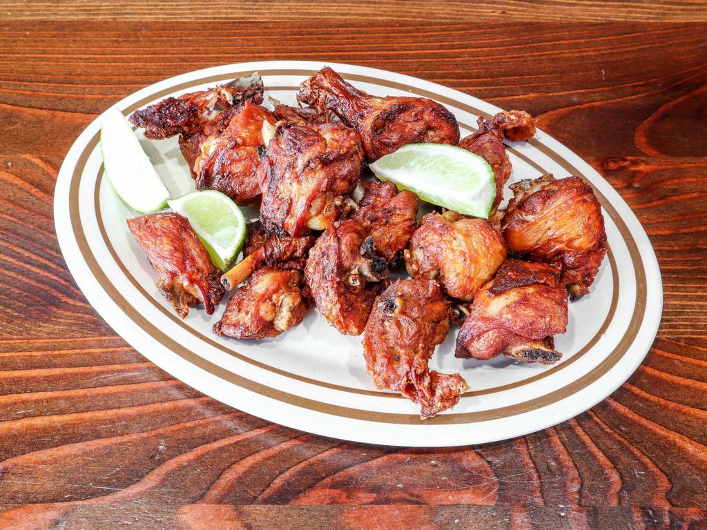 Chicharrones de Pollo · Fried chicken chunks.