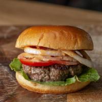 Ham burger deluxe  · 100 percent beef with lettuce tomato onion and pickle 
