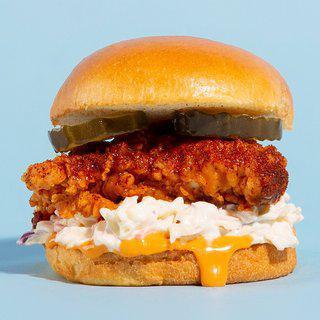 Buffalo Ranch Fried Chicken Sandwich · Swiss cheese, ranch dressing, buffalo sauce, tomato, lettuce, pickles, onions, brioche bun, side fries