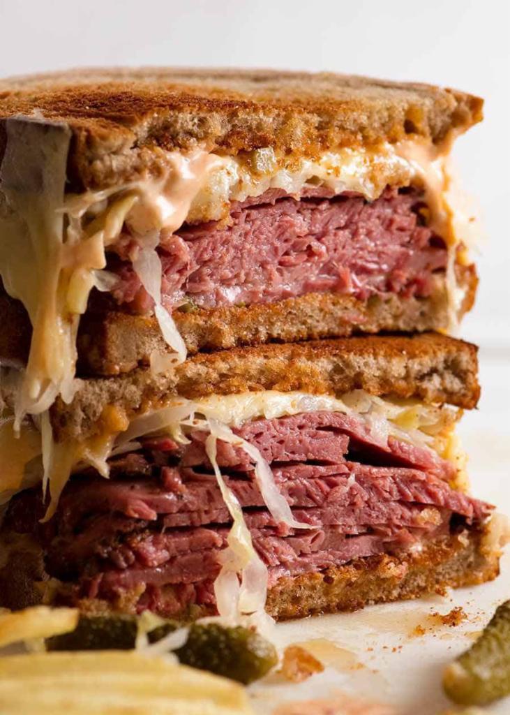 Reuben Sandwich · Pastrami or corn beef melted Swiss cheese, sauerkraut & Russian dressing served on a grilled rye bread.