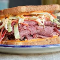 Pastrami Sandwich · Pastrami, Swiss cheese, coleslaw, chipotle mayo on a focaccia.