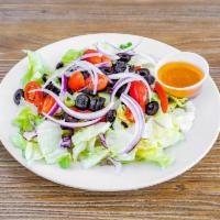 Garden Salad · Mixed lettuce, tomatoes, cucumbers, onions, olives and roasted peppers.