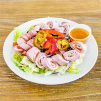 Antipasto Salad · Ham, salami, provolone, capicola, over a garden salad.
