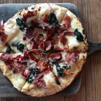 Speck · fontina, spinach, red onion, calabrese chili
*Speck is a ham