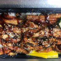 Unagi don · Broil eel over sushi rice