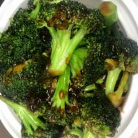 Sauteed Broccoli · Served w. Rice