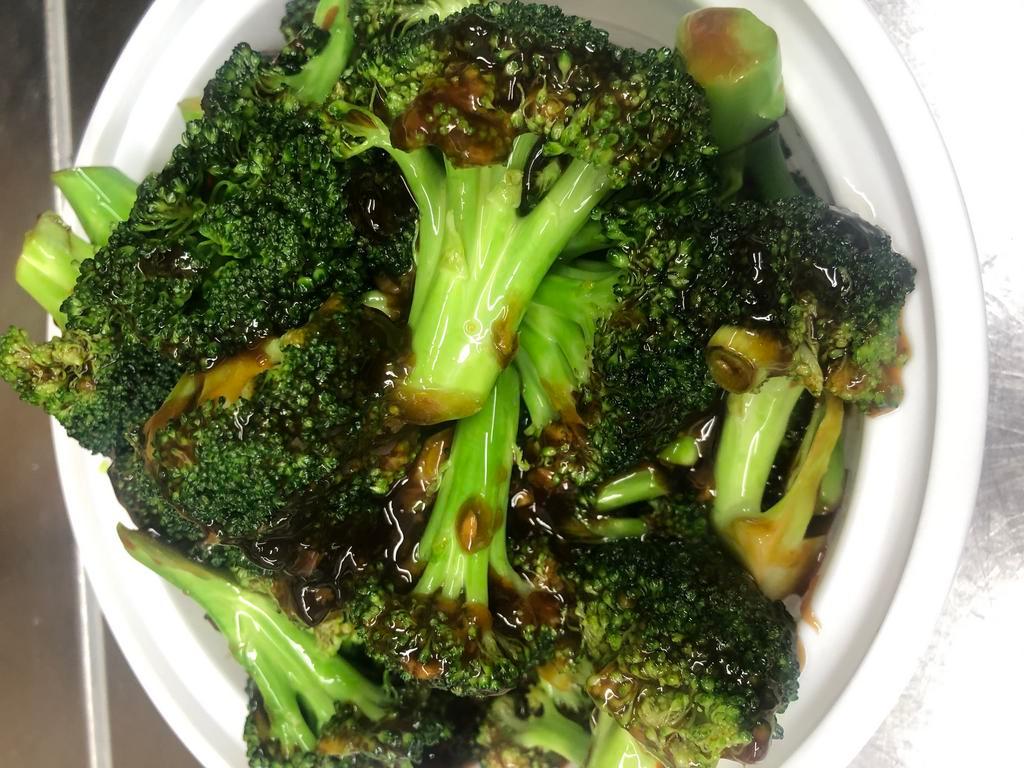 Sauteed Broccoli · Served w. Rice