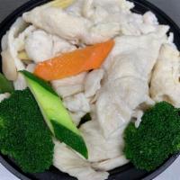 Steamed White Meat Chicken w. Mixed Veggie · Served with Rice and Dipping Sauce.