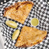 Quesadilla · Pastor, fajita, chicken, or birria. Cooked tortilla that is filled with cheese and folded in...