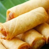 Thai Spring Rolls · Poh pai tod. Our twist to egg rolls filled and minced with chicken, pork, vegetables and ric...
