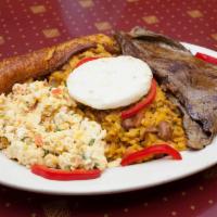 Desayuno Ejecutivo · Calentado o arepa con queso, huevos pericos, carne asada o pechuga de pollo. Rice and beans ...