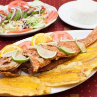 Pargo Rojo/Red Snapper · Servido con frijoles, arroz, platano maduros, y ensalada. Served with beans, rice, sweet pla...